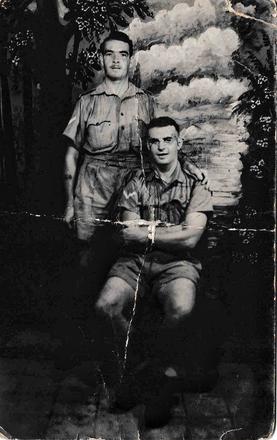 LCpl. Matthew Younger No.11 Cdo sitting and unknown