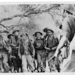 Stanley Buckmaster, Jock Cree,  and others from 5 troop No.2 Cdo. with prisoners