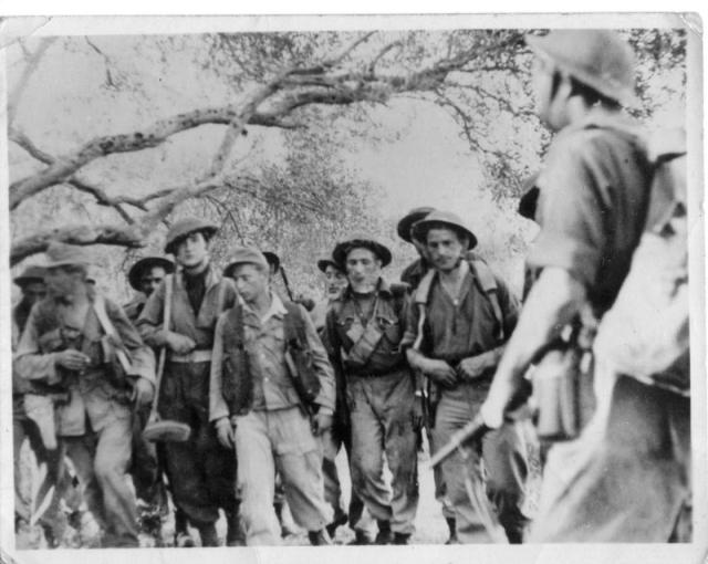Stanley Buckmaster, Jock Cree,  and others from 5 troop No.2 Cdo. with prisoners