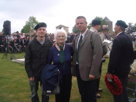 Muriel, widow of John Lilley, with her grandson & Stéphane, Ranville cemetery 6th June 2010.