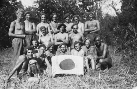 Group of No5 Cdo with captured Japanese Flag