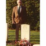 Donald Martin at the grave of Private Owen Hooper No.4 Commando