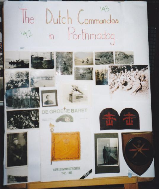Display board (2) of photos of Dutch troop 10IA Cdo.