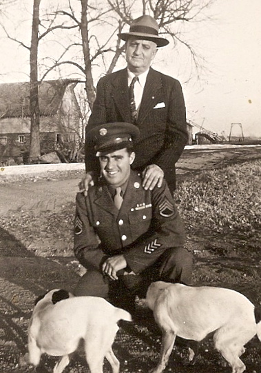 Staff Sgt Patrick Duffy with his father and his 2 dogs