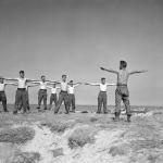 Petty Officer Douglas E. McIntyre leads the exercises