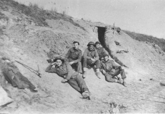 Robinson Collins and others,  43 RM Cdo 'E' tp.,on the South bank of River Reno, Commachio 1945.