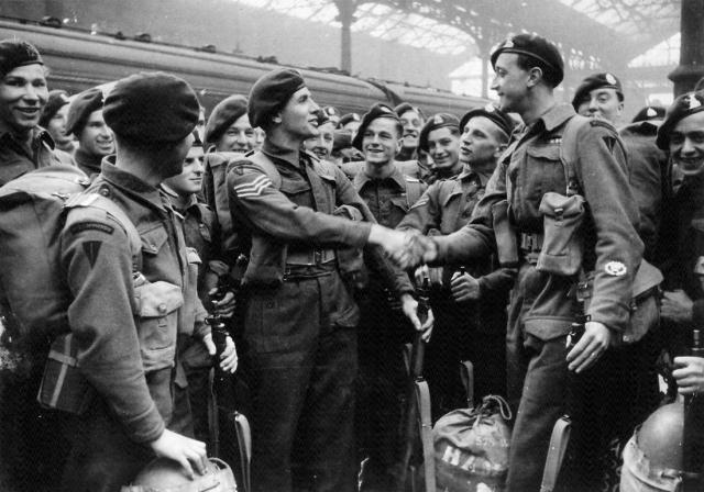 TSM 'Lofty' Hampson 4 tp No.3 Cdo shaking hands with a Sgt.