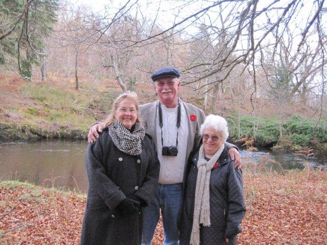 Kevin, Bob and Janet Bishop on the bank of the River Arkaig