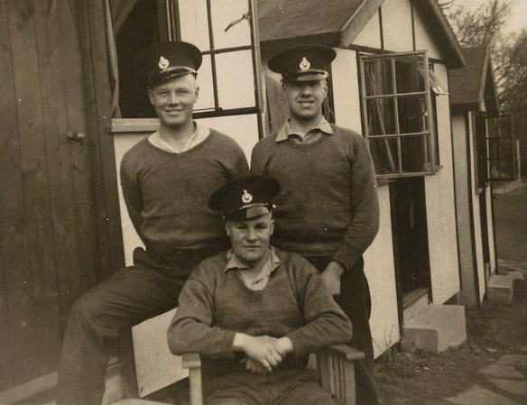 Harold Plank (seated) and 2 unknown