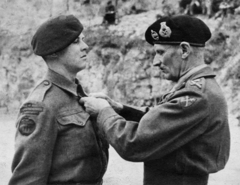 Marine Thomas Vardy 46RM Commando receiving his Military Medal from Montgomery