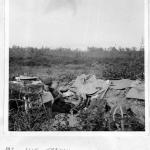 L/Cpl.  'Ken' Emmerson, No.1 SS Bde. HQ,  in a slit trench at Le Mesnil