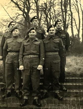No.3 Commandos Cpl Philip Logan (rear middle), CSM John Leech MM* (front middle), and others