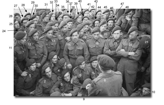 Men of No. 4 Commando being briefed before D-Day (a)