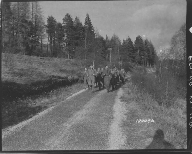 Members of a U.S. Ranger Battalion on a speed march 7th Feb.'43