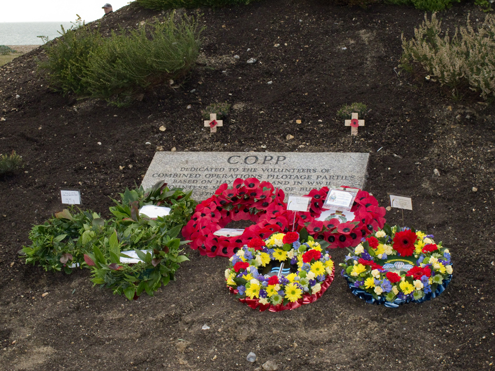 Wreaths by the Plaque at the Memorial