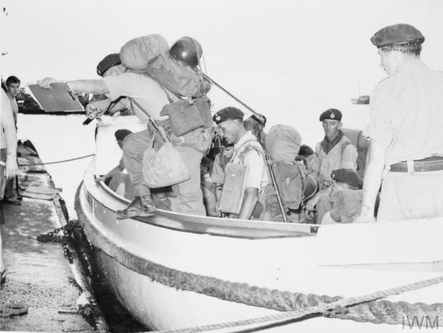 Officers and men of 45 Commando embark on HMS Centaur, Aden Jan. 1964