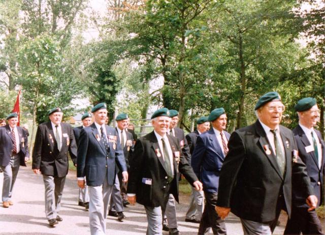 Veterans marching to the gun battery