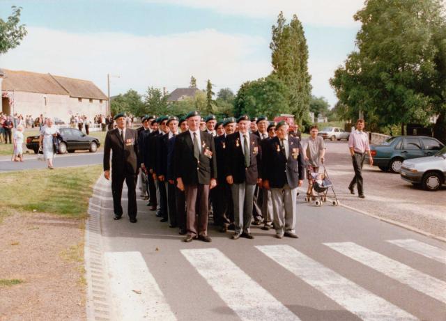 Veterans line up before marching to the 45RM Cdo memorial cross in Le Plein 6th June 1997