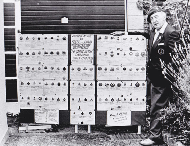 Ken Phillott and his collection of Commando 'parent' unit badges