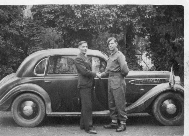Pte John.Gallacher, unknown,  & the CO's car. Salonika 1944.