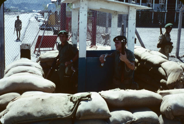 Gunner Dave Millward and Sgt. Adams on stag last day in Aden