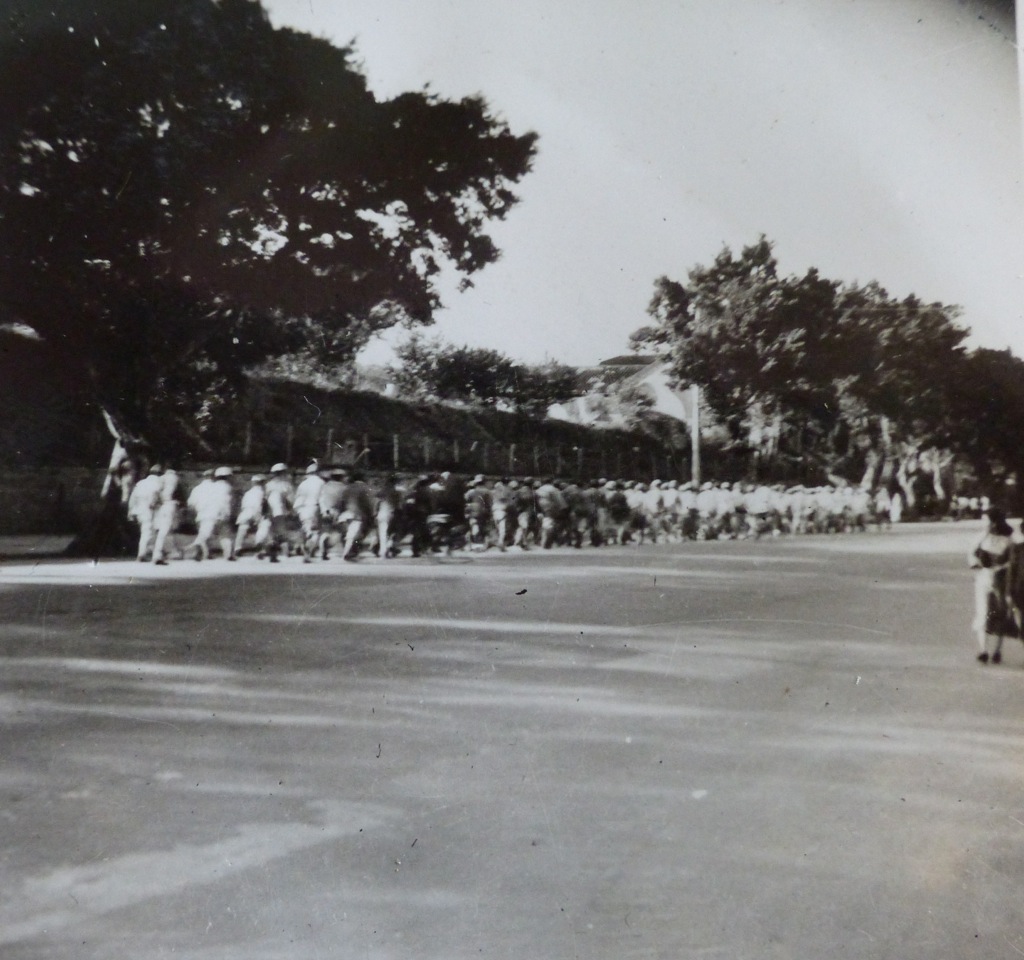 Japanese POW's marching to Sham Shui Po