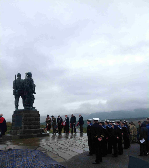 Lieutenant Colonel Peter Little OBE, OC 7 Scots, lays a wreath