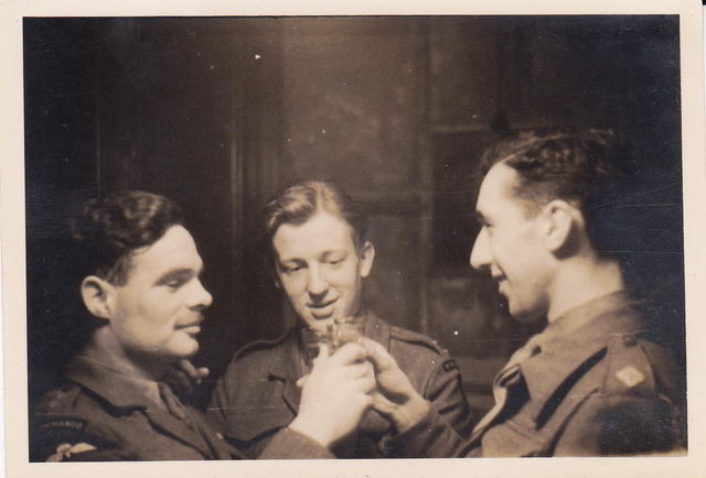 Lt Angus Ferguson No 9 Cdo. (left) and 2 unknown officers