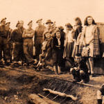 Group from 1 Troop, No 9 Cdo with local people at Strymon Bridge, Greece, November 1944