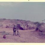 US Marines Amtrac going through 79 Commando Light Bty Gun Position