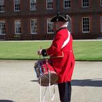 A drummer beats the Call to Parade...