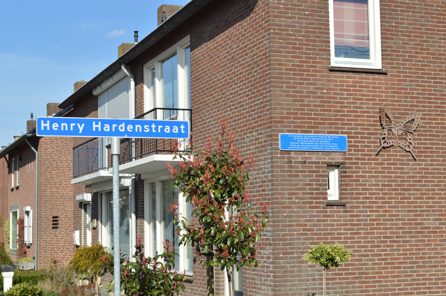 Street sign and wall plaque for Henry Eric Harden VC