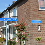 Street sign and wall plaque for Henry Eric Harden VC