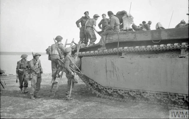 Royal Engineers climb into a Buffalo for the crossing of the Rhine 24 March 1945