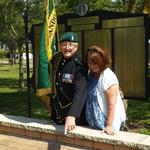 Fred Davies shows Anne George her father's paver