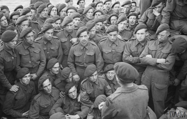 Men of 4 Commando being briefed by Lt Col R Dawson in preparation for D Day.