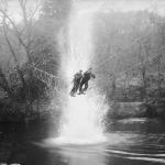 Commandos cross a river on a 'toggle bridge'