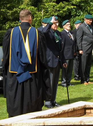 Mac McNickle lays the wreath and pays his respects.