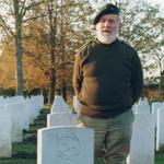 Geoff Broadman at the grave of Ernest Norton [Nathan]