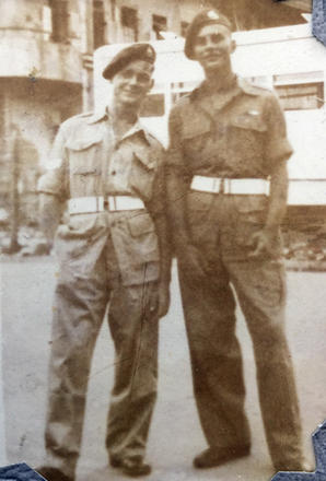Cpl. J.J. O'Sullivan (left) and ?, 45 Commando, o/s the Fleet Club, Hong Kong Aug. 1946