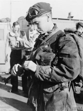 Unknown 45 Commando priming a grenade - Suez Crisis - Operation Musketeer 1956