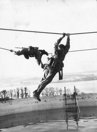 Recruits at CTCRM over water tank attempting regain