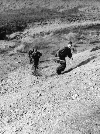 Recruits running up old wartime butts on Endurance Course.