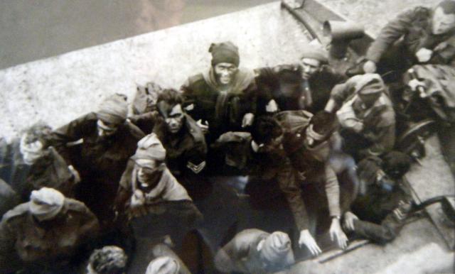 Close up photo of Commandos disembarking from their ALC after the St Vaast raid.
