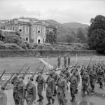 Col Vaughan taking the salute of French Commandos at Achnacarry