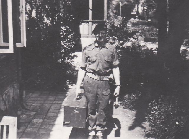 C /Sgt Bob 'Beau' Ghest carrying the radio set
