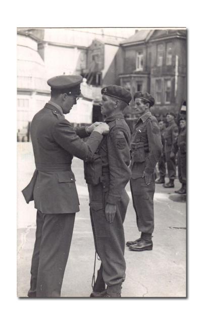Medal ceremony for Pte. Niek J. de Koning, No.2 Dutch troop 10 (IA) Commando