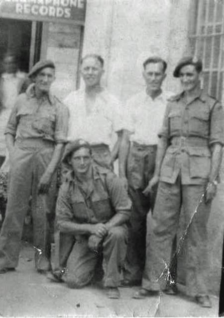 Dick Hawkins (standing 2nd right) and others - No.1 Commando.