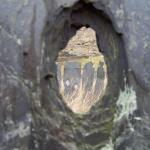 Bullet holes in slate fence