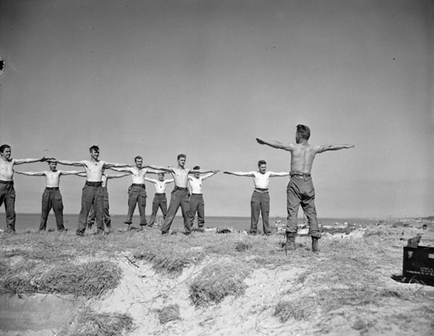 Petty Officer Douglas E. McIntyre leads the exercises